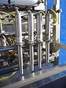 Hinds Bock Corp. Llenador de pistón de 4 cabezas de acero inoxidable, 1 cuarto de galón