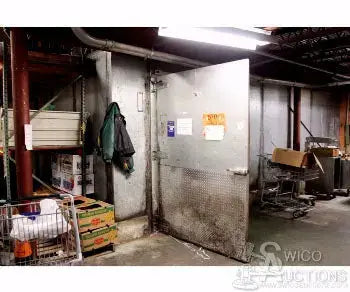 Walk-In Freezer Door with Refrigeration Coils