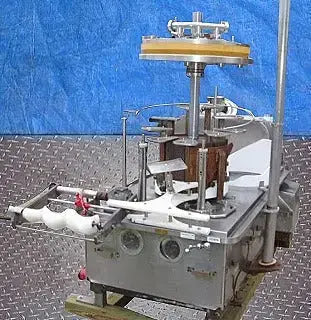 Llenadora a presión rotativa Pacific de 9 cabezales