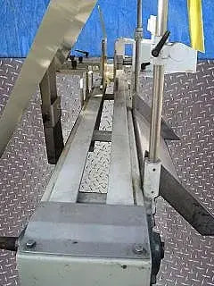 Transportador superior flexible