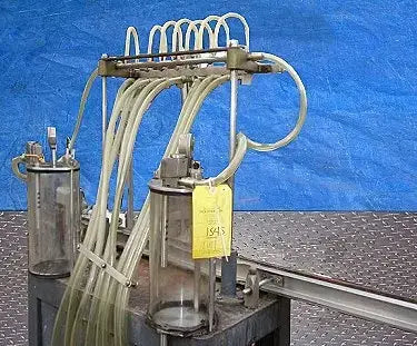 Llenadora al vacío de 8 cabezales de US Bottlers