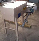 Sección del transportador con mecanismo de rechazo