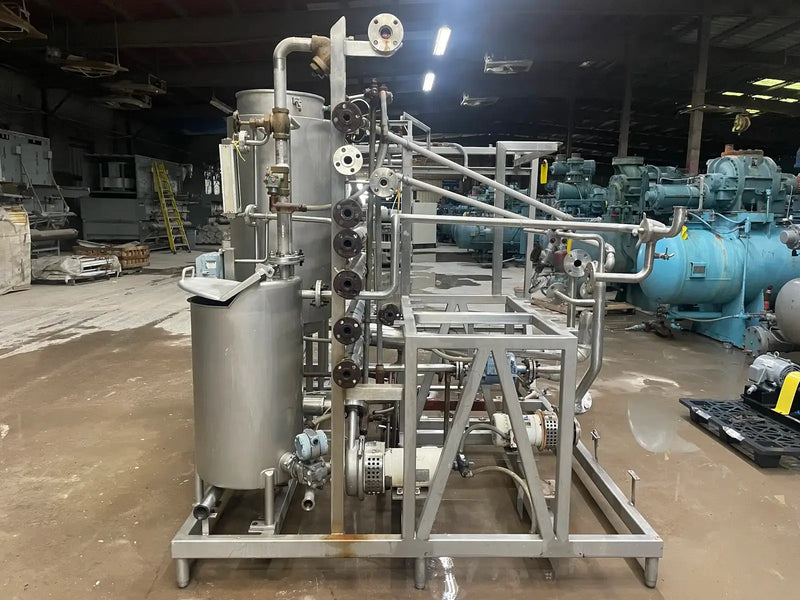 Essence Recovery Skid With Storage Tanks and Pumps