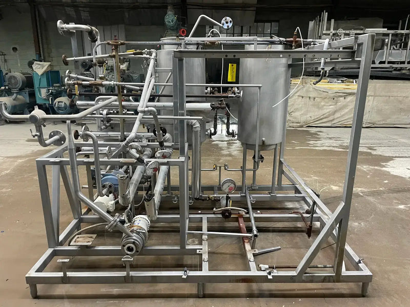 Essence Recovery Skid With Storage Tanks and Pumps