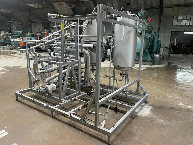 Essence Recovery Skid With Storage Tanks and Pumps