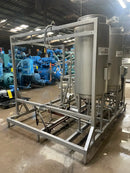 Skid de recuperación de esencias con tanques de almacenamiento y bombas