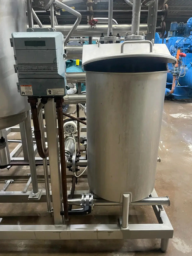 Essence Recovery Skid With Storage Tanks and Pumps