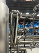 Skid de recuperación de esencias con tanques de almacenamiento y bombas