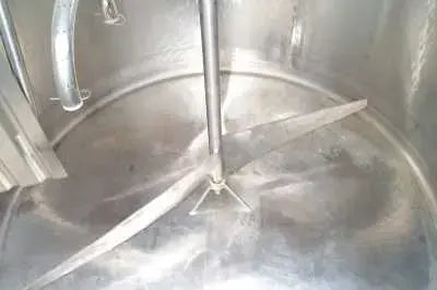 Procesador Mueller de acero inoxidable - 400 galones