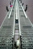 Orics Infeed Dual Belt Cleated Conveyor