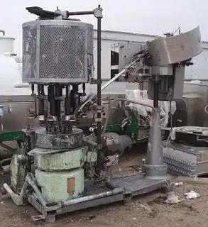 Taponadora de 8 cabezales Serie Pneumacap de Tire Scale Corporation