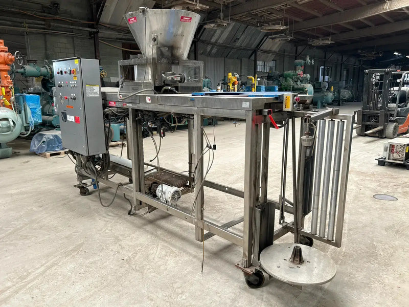 Sistema automático de envasado de hielo con llenado y sellado de forma 535 de Hamer Inc.