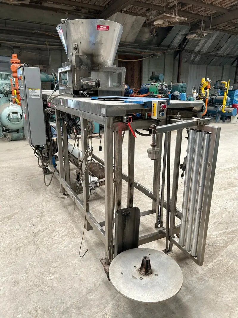 Sistema automático de envasado de hielo con llenado y sellado de forma 535 de Hamer Inc.