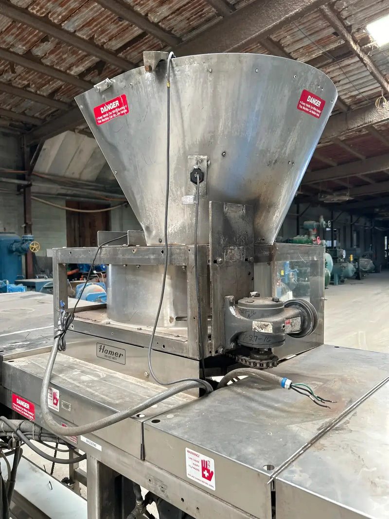 Sistema automático de envasado de hielo con llenado y sellado de forma 535 de Hamer Inc.