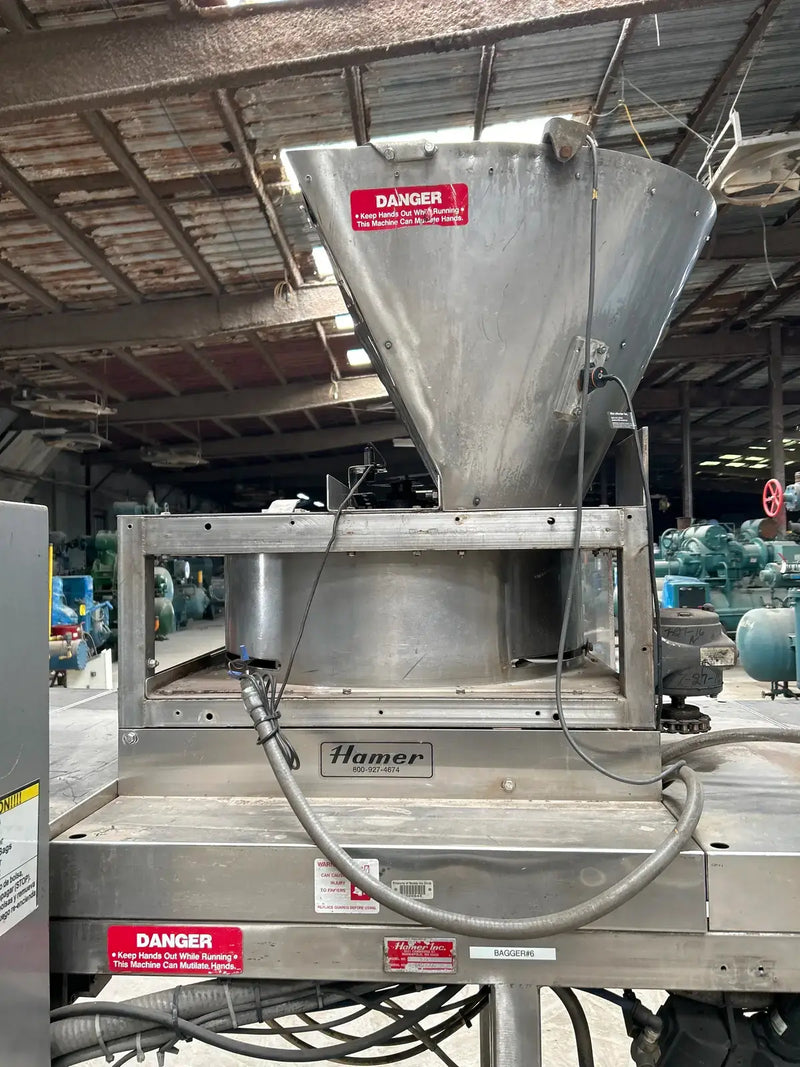Sistema automático de envasado de hielo con llenado y sellado de forma 535 de Hamer Inc.