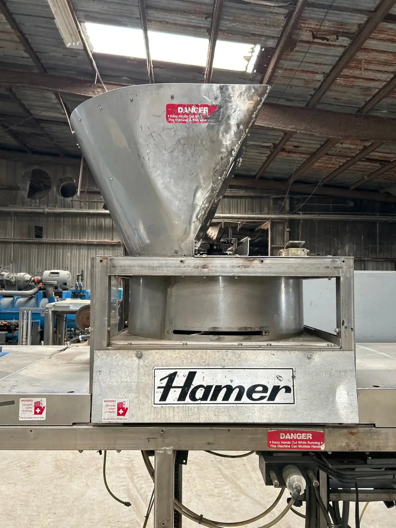 Sistema automático de envasado de hielo con llenado y sellado de forma 535 de Hamer Inc.