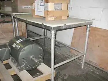 Mesa superior de teflón con estructura de acero inoxidable