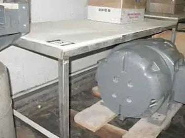 Mesa superior de teflón con estructura de acero inoxidable