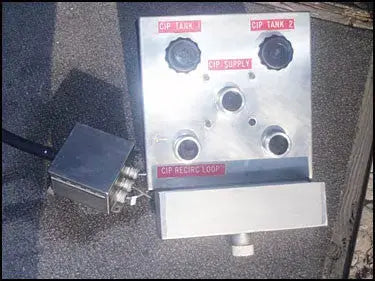 Colector de acero inoxidable con caja de control