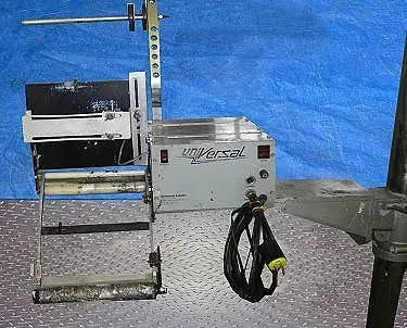 Aplicador universal de etiquetas de limpieza con soporte ajustable