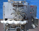 Gilbreth Packaging Systems/Culbro Machine Systems Neck Bander Gilbreth Packaging Systems/Culbro 