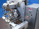 Gilbreth Packaging Systems/Culbro Machine Systems Neck Bander Gilbreth Packaging Systems/Culbro 