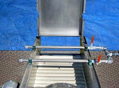 Heinzen HMI Pasteurizing Conveyor for Whole Citrus Fruit Heinzen Manufacturing Inc. 