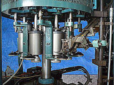 Pneumatic Scale Corporation 8-Head Capper with Rotating Cap Sorter Pneumatic Scale Corporation 