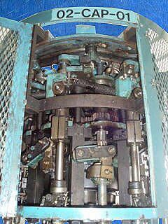 Pneumatic Scale Corporation 8-Head Capper with Rotating Cap Sorter Pneumatic Scale Corporation 