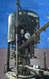Pneumatic Scale Corporation 8-Head Capper with Rotating Cap Sorter Pneumatic Scale Corporation 